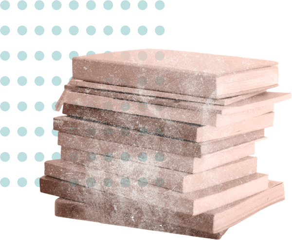 Stack of dusty beige books with a blue dotted pattern in the background.