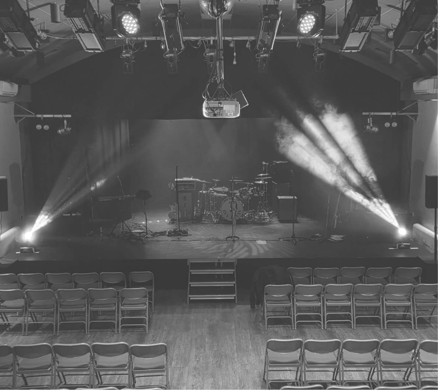Theatre chairs looking towards stage